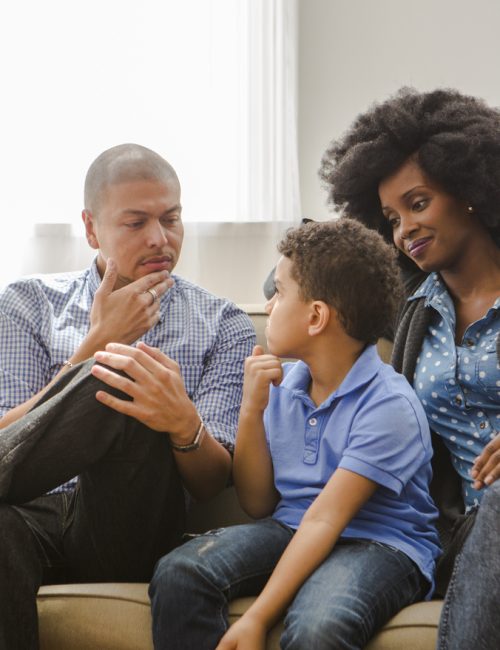 A couple having a "the talk" with their young son.